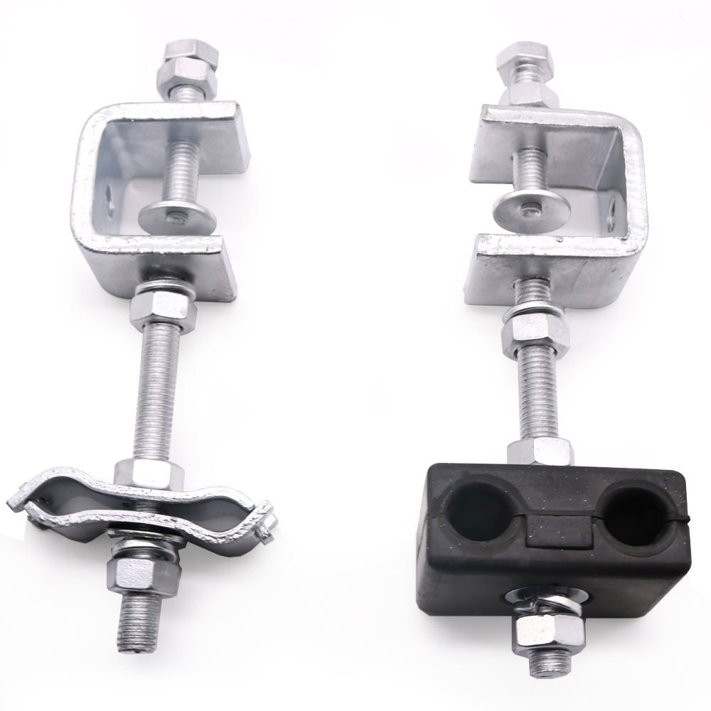Optical fiber downlead clamp with rubber cushion