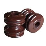 Shackle insulator on utility pole