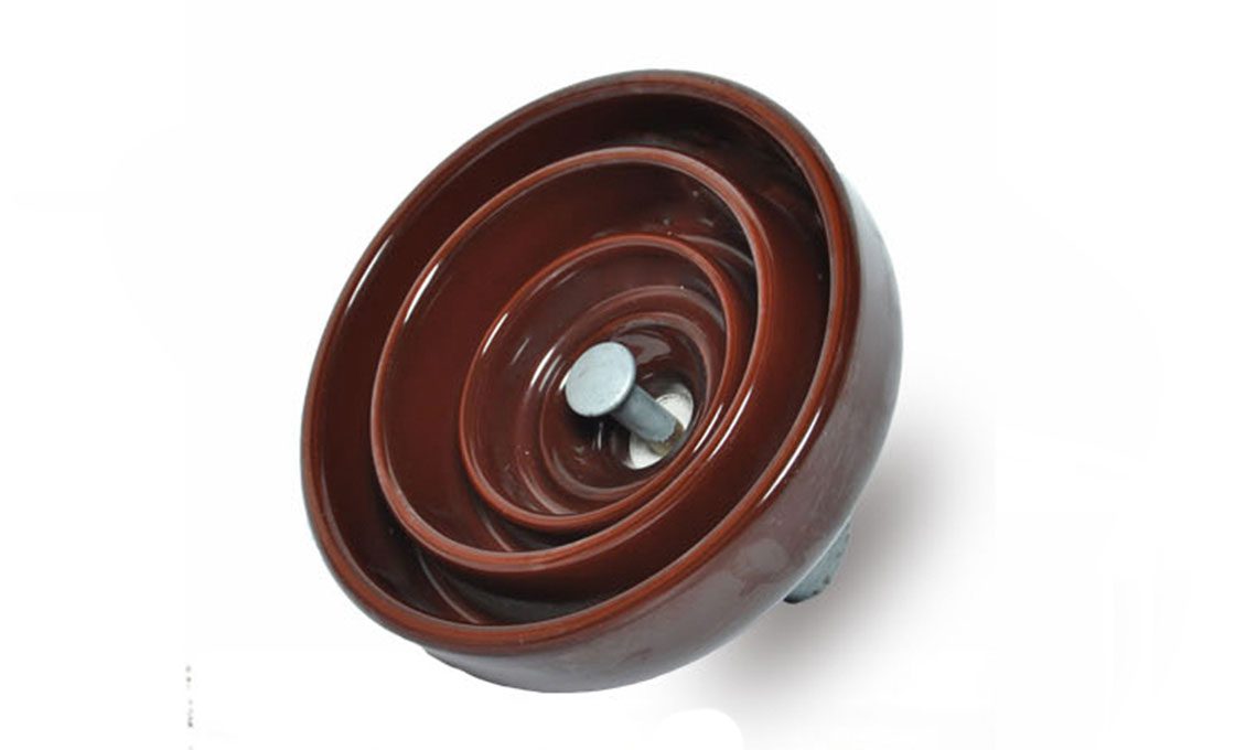 Disc suspension insulator assembly